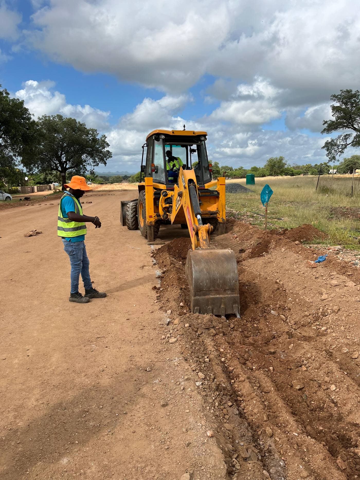 Machinery working on rural road preparation